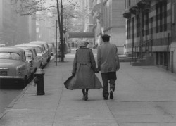Couple walking Park Avenue, New York, 1960